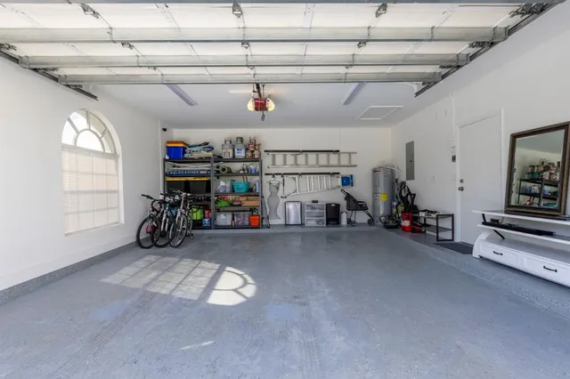 a view of a garage with rack and bicycle
