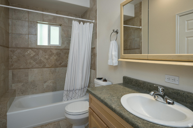 684 Blue Mountain Ridge Monticello, UT 84535 - Photo 43 of 71 Full bath featuring vanity and shower / bath combination with curtain