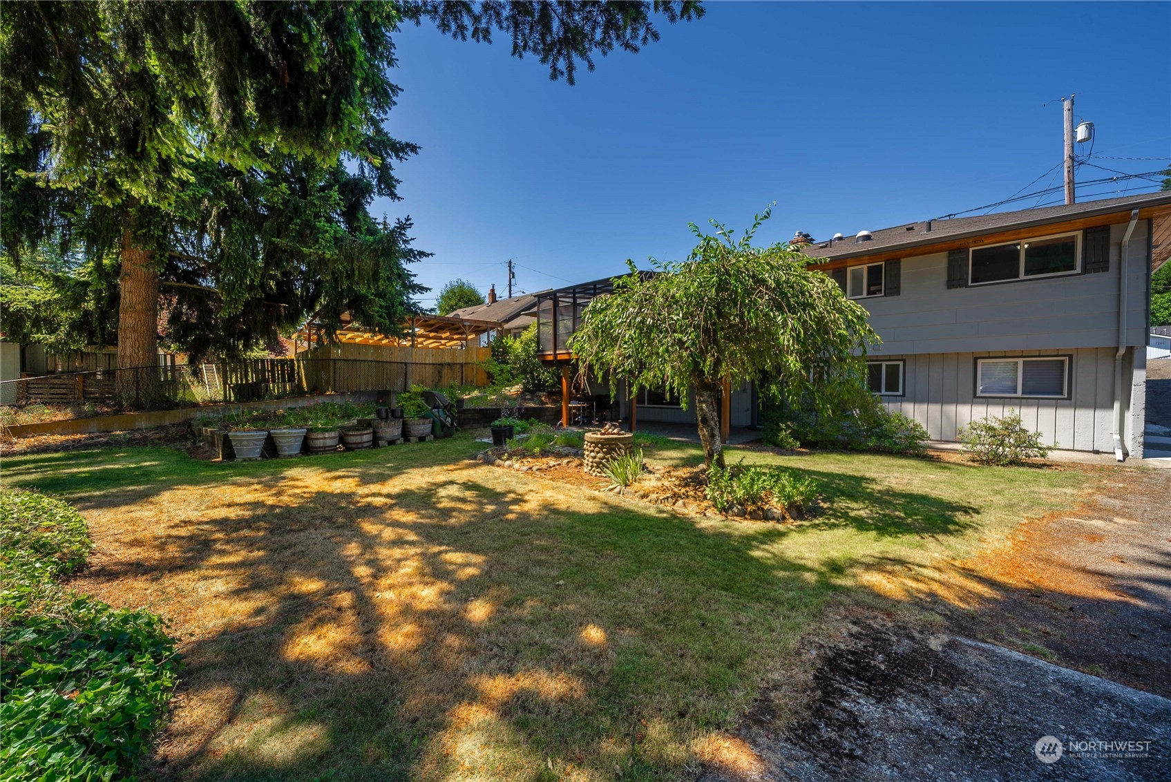 7211 Beverly Boulevard Everett, WA 98203 - Photo 31 of 36 a view of backyard with swimming pool and outdoor seating