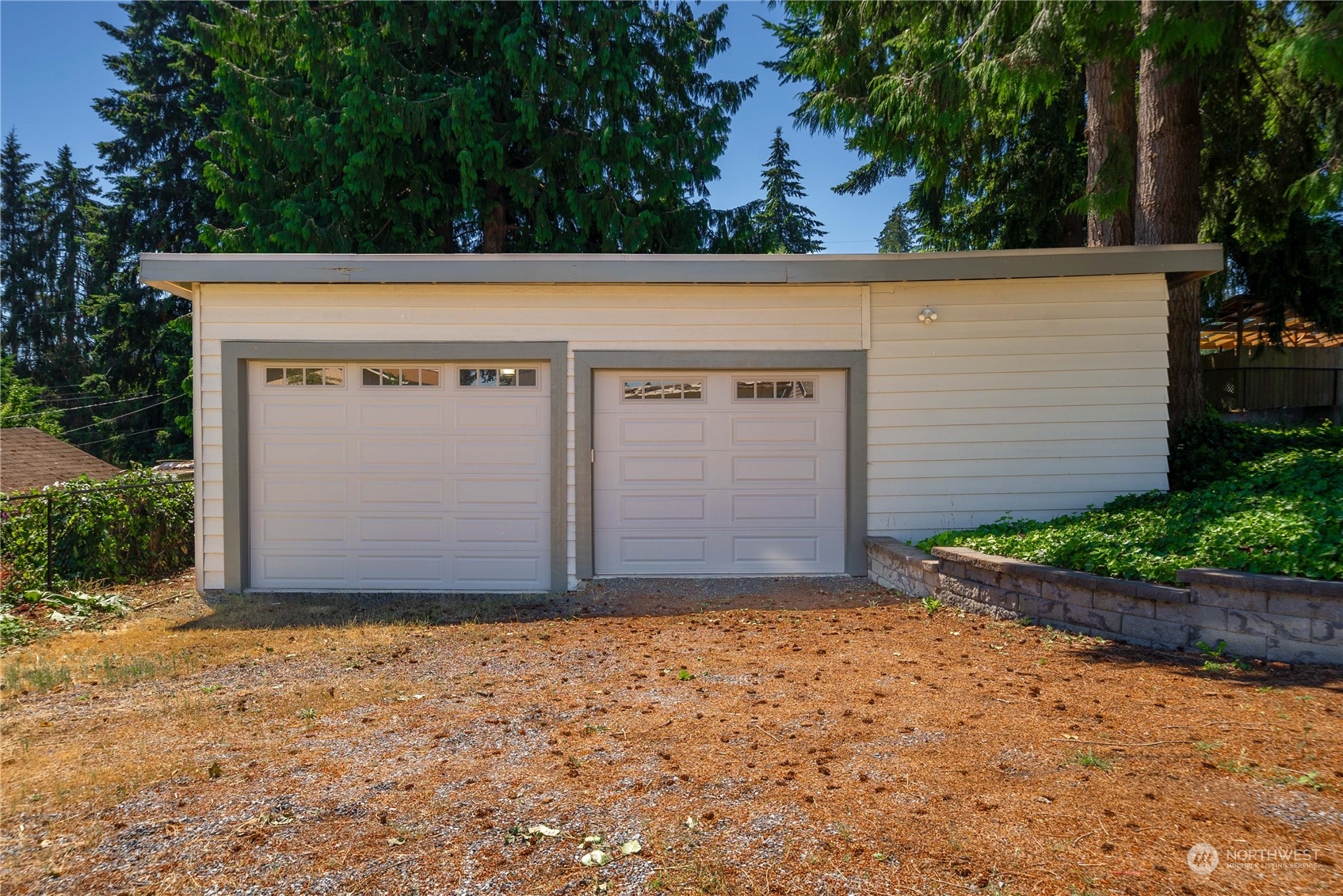 7211 Beverly Boulevard Everett, WA 98203 - Photo 33 of 36 a view of backyard with large trees