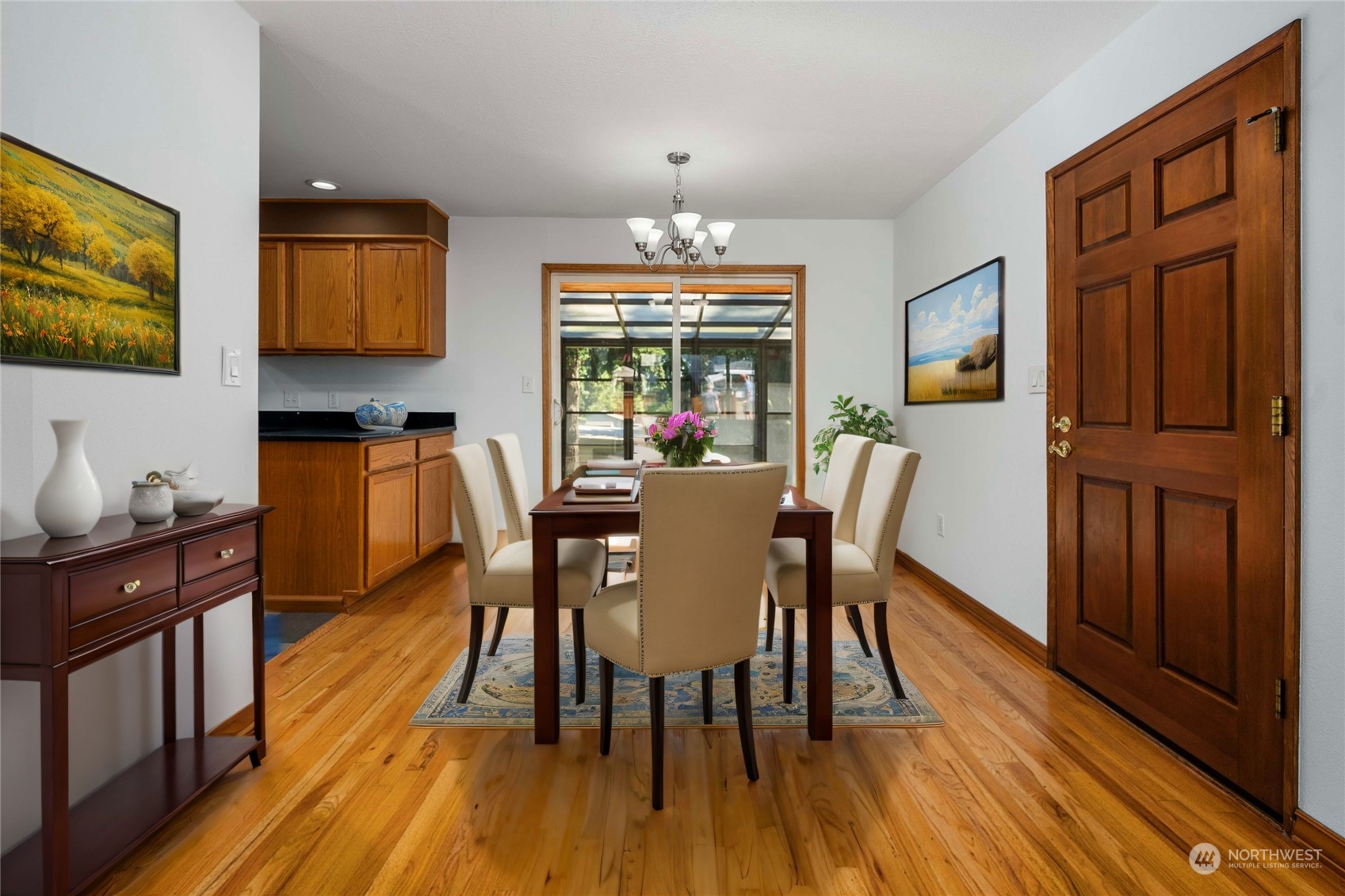 7211 Beverly Boulevard Everett, WA 98203 - Photo 7 of 36 a view of a dining room with furniture window and wooden floor