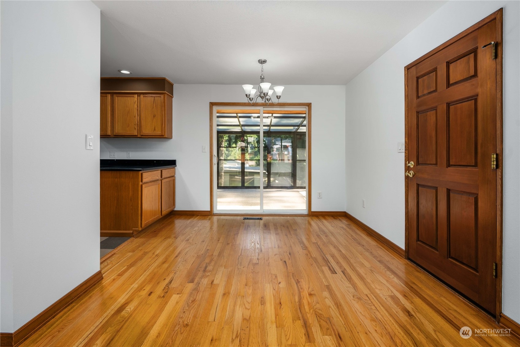 7211 Beverly Boulevard Everett, WA 98203 - Photo 8 of 36 wooden floor in an empty room with a window