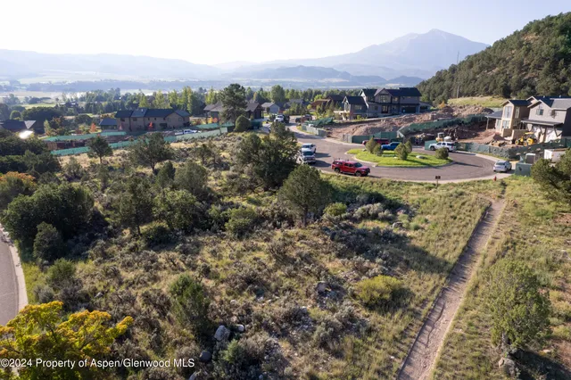 a view of a houses with a yard