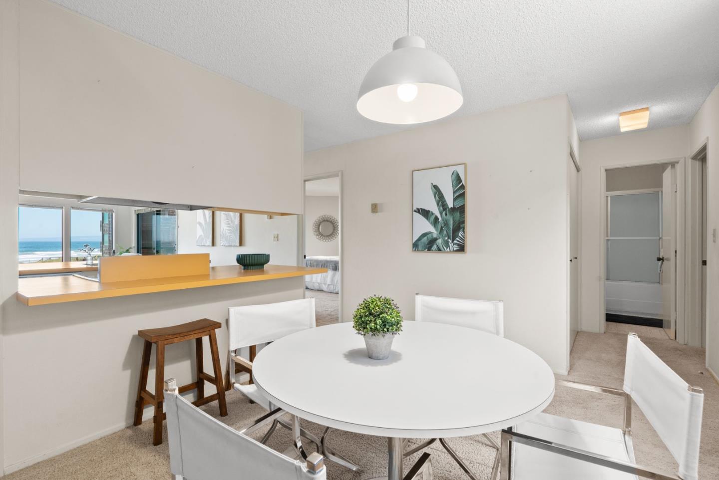 101 Shell Road, Unit 227 Watsonville, CA 95076 - Photo 13 of 29 a living room with furniture and a table