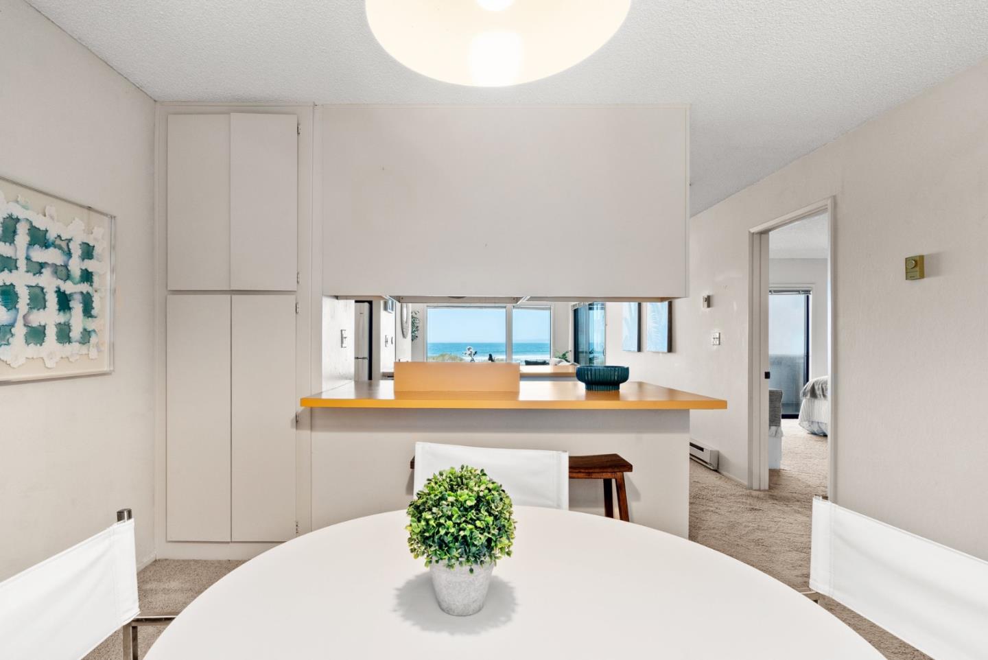 101 Shell Road, Unit 227 Watsonville, CA 95076 - Photo 14 of 29 a living room with stainless steel appliances kitchen island granite countertop furniture and a fireplace