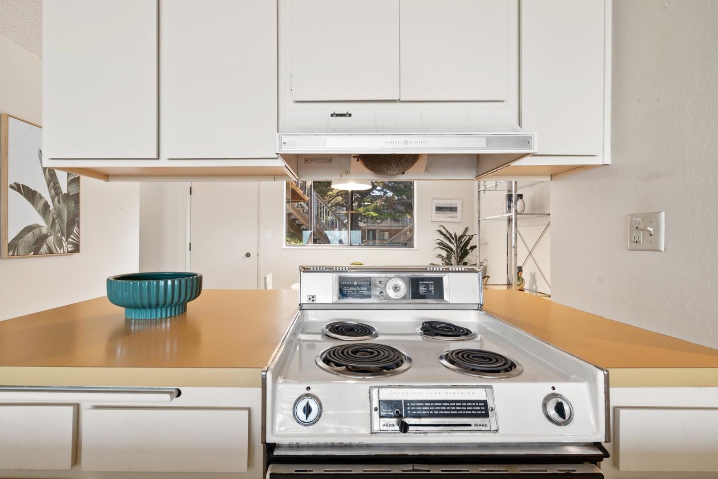 101 Shell Road, Unit 227 Watsonville, CA 95076 - Photo 17 of 29 a stove top oven sitting inside of a kitchen