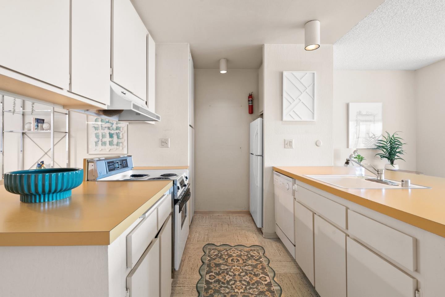 101 Shell Road, Unit 227 Watsonville, CA 95076 - Photo 18 of 29 a spacious bathroom with a double vanity sink a mirror and a bathtub