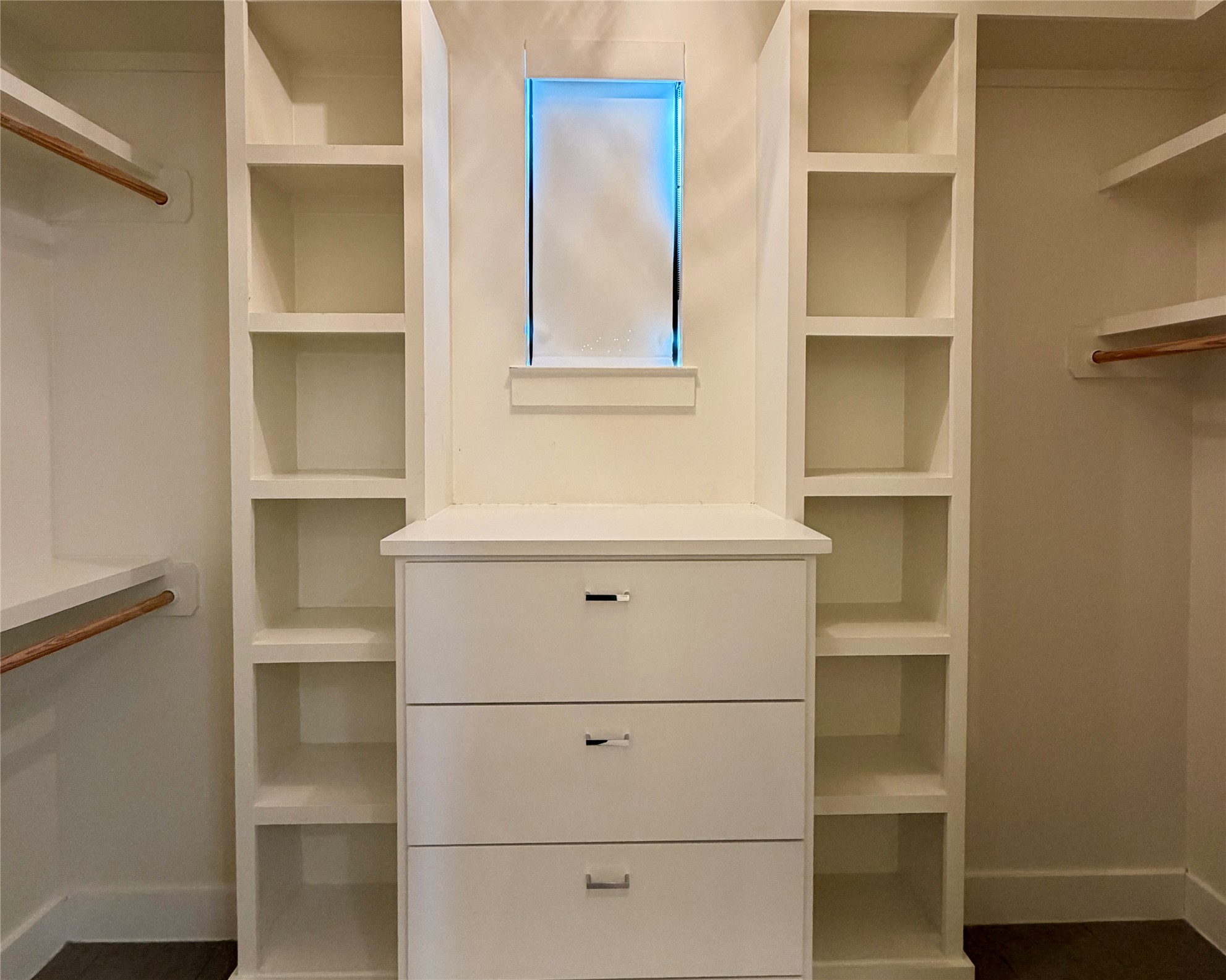 1515 Hether Street, Unit B Austin, TX 78704 - Photo 17 of 30 Custom-built closet system with shelving and integrated drawers provides organized storage.