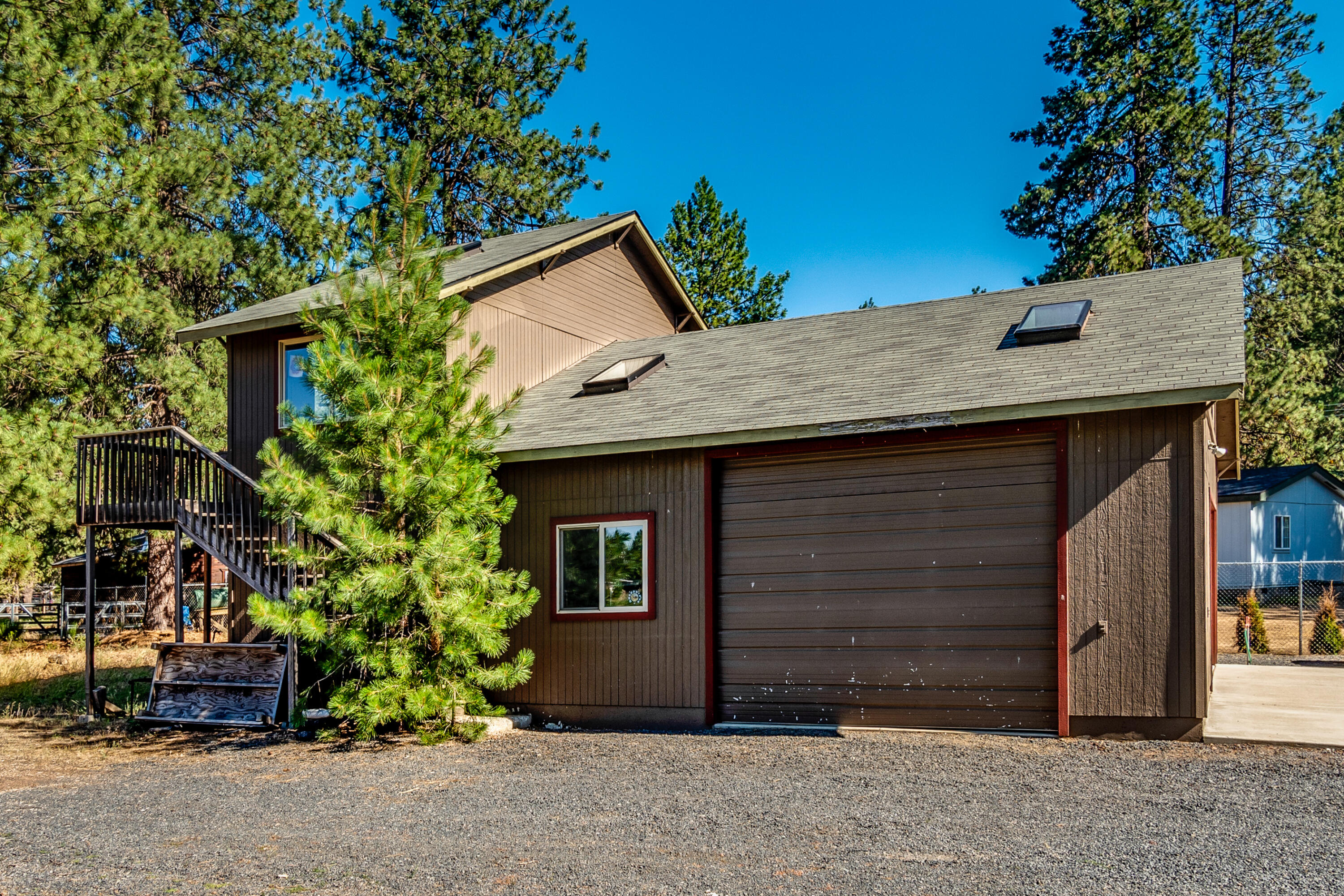 19238 Baker Road Bend, OR 97702 - Photo 37 of 64 32'x40' Shop with Studio above w/ built in cabinets & 2 roll doors