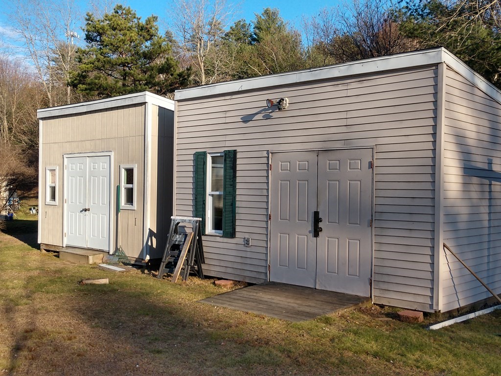 414 Palmer Road Ware, MA 01082 - Photo 5 of 16 a view of a house with backyard