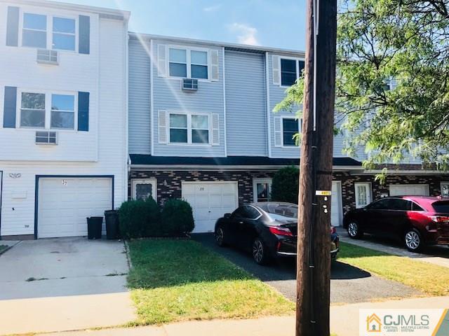 a view of a car parked in front of a building