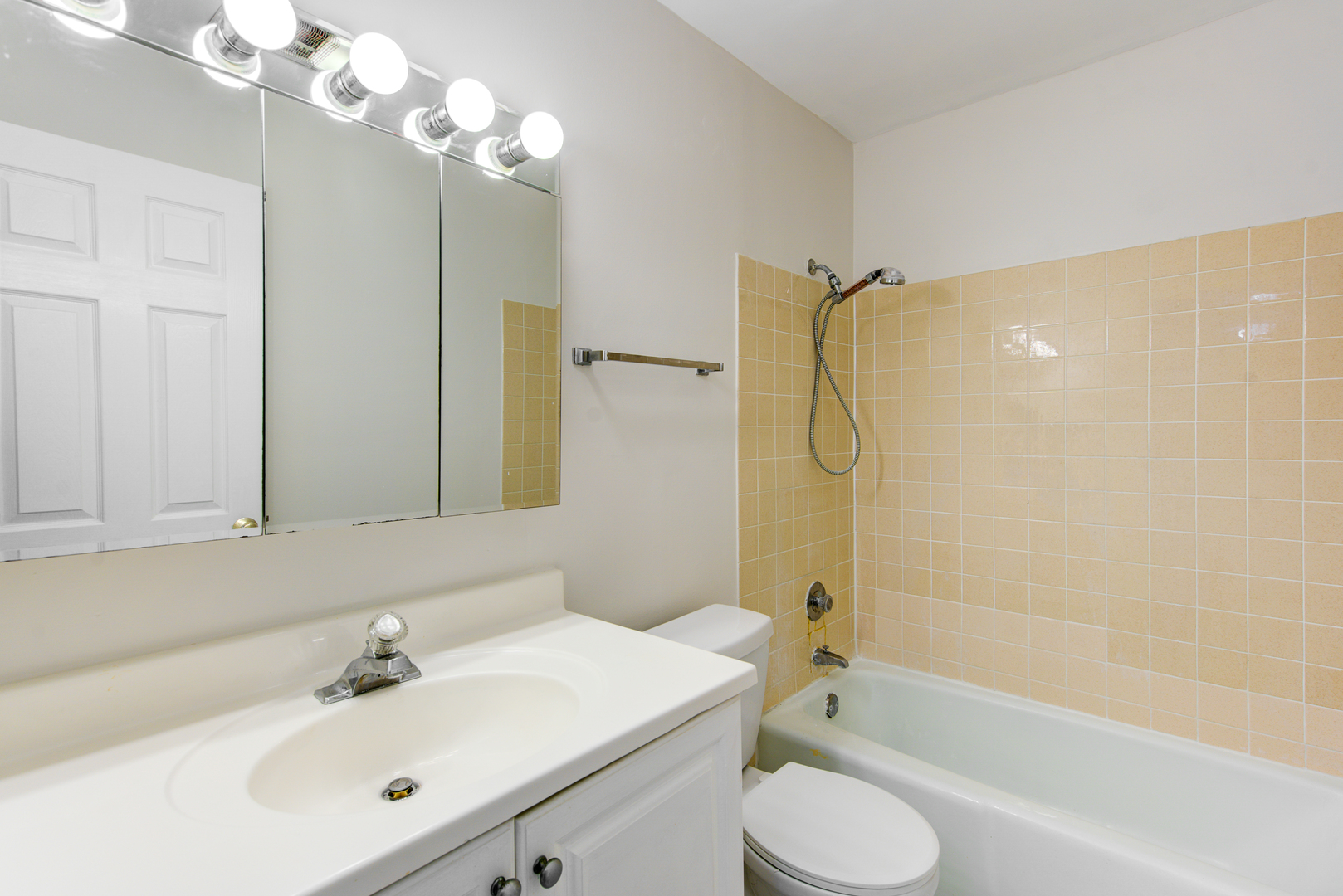 430 North Wilke Road, Unit 105 Palatine, IL 60074 - Photo 11 of 15 a bathroom with a sink a toilet and shower