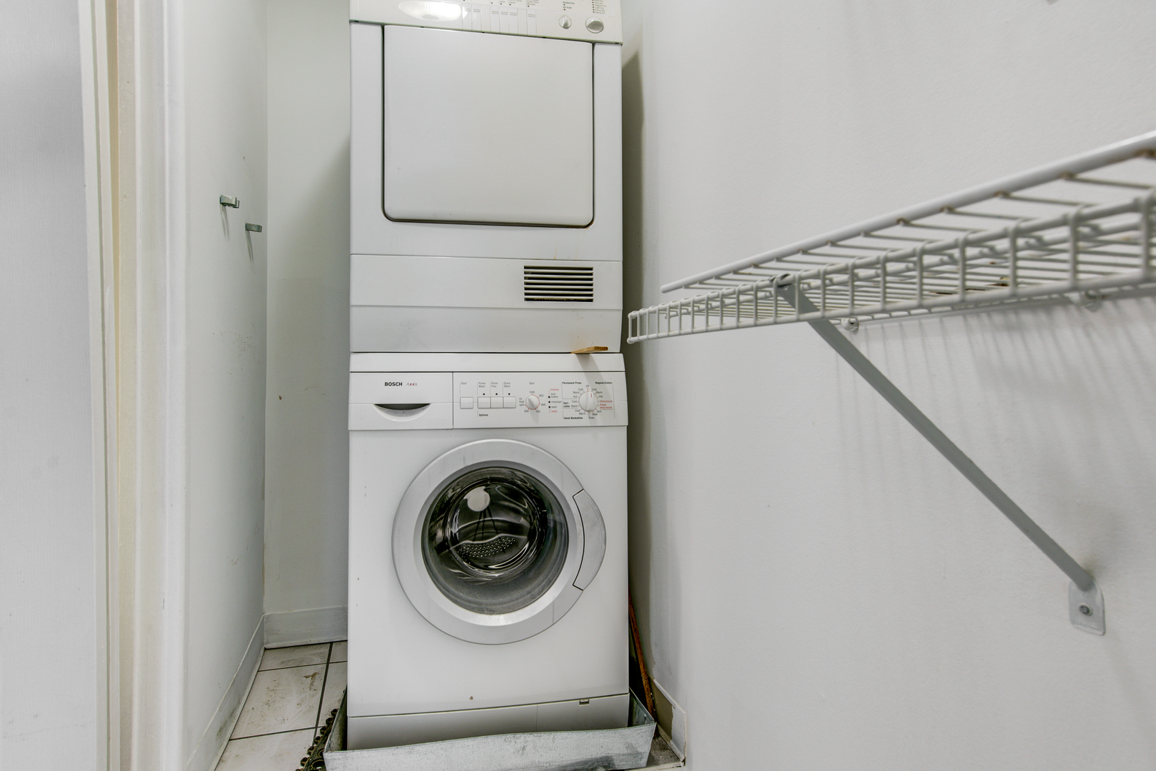 430 North Wilke Road, Unit 105 Palatine, IL 60074 - Photo 12 of 15 a utility room with dryer and washer