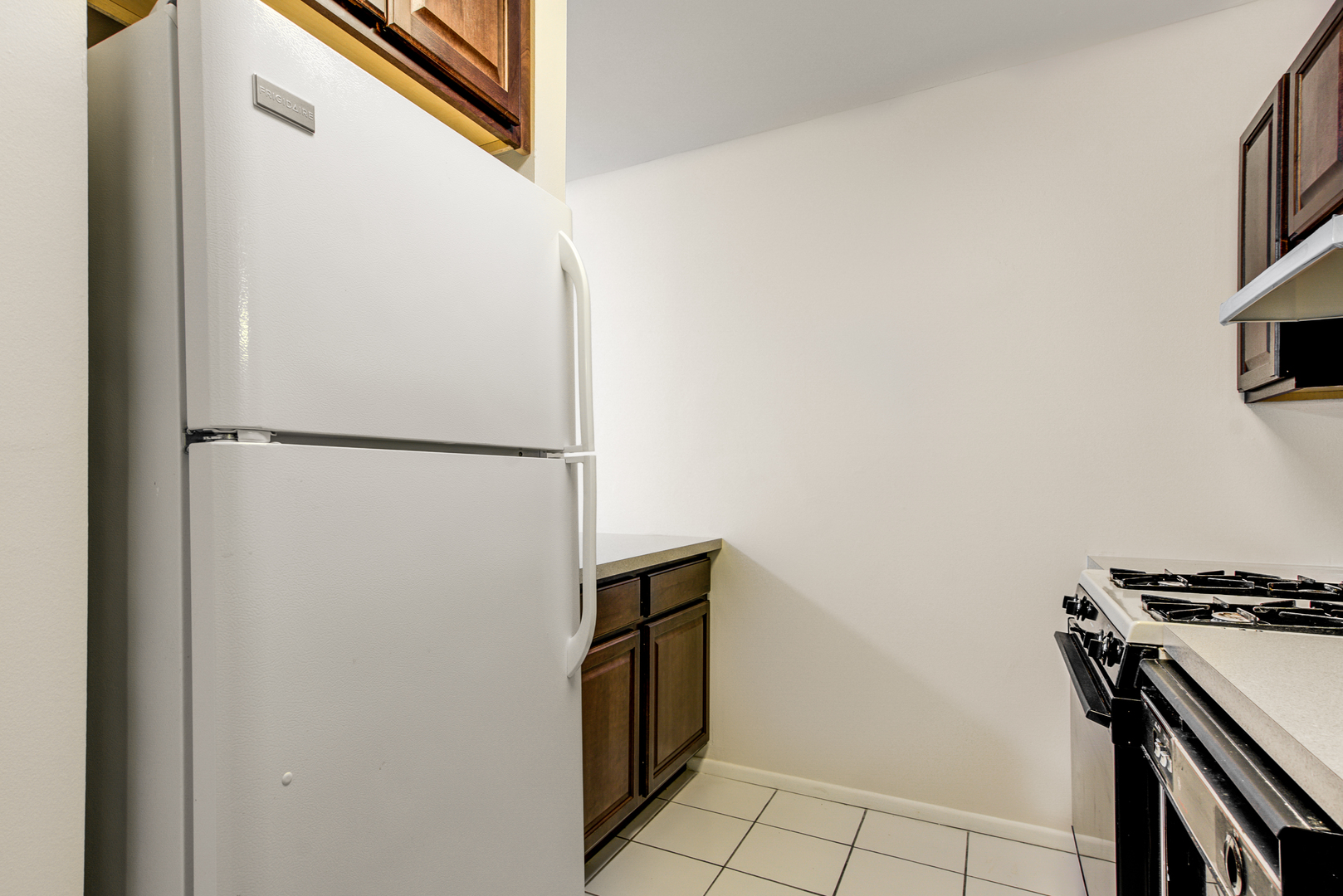 430 North Wilke Road, Unit 105 Palatine, IL 60074 - Photo 8 of 15 a view of a storage and utility room with washer and dryer