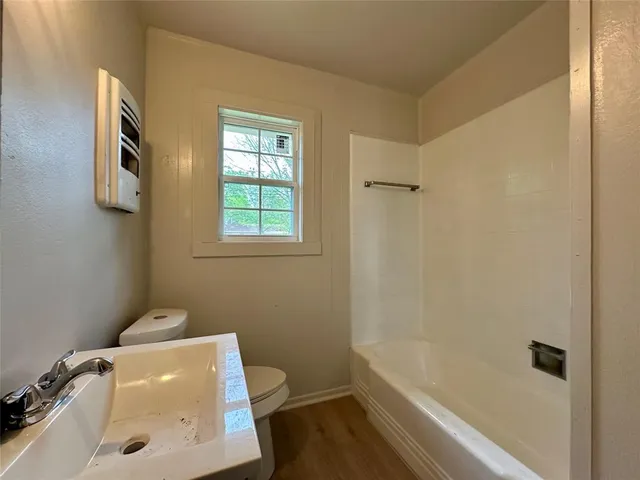 a bathroom with a sink and a bathtub