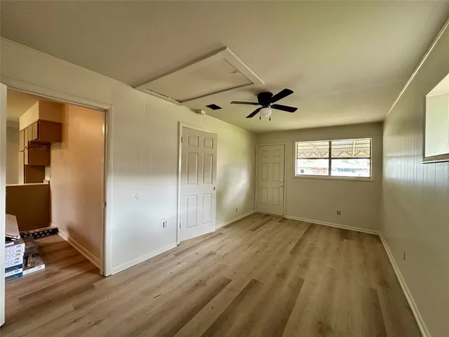a view of entryway with wooden floor