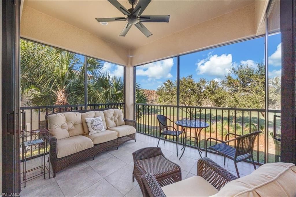8773 Bellano Court, Unit 201 Naples, FL 34119 - Photo 4 of 34 a balcony with furniture