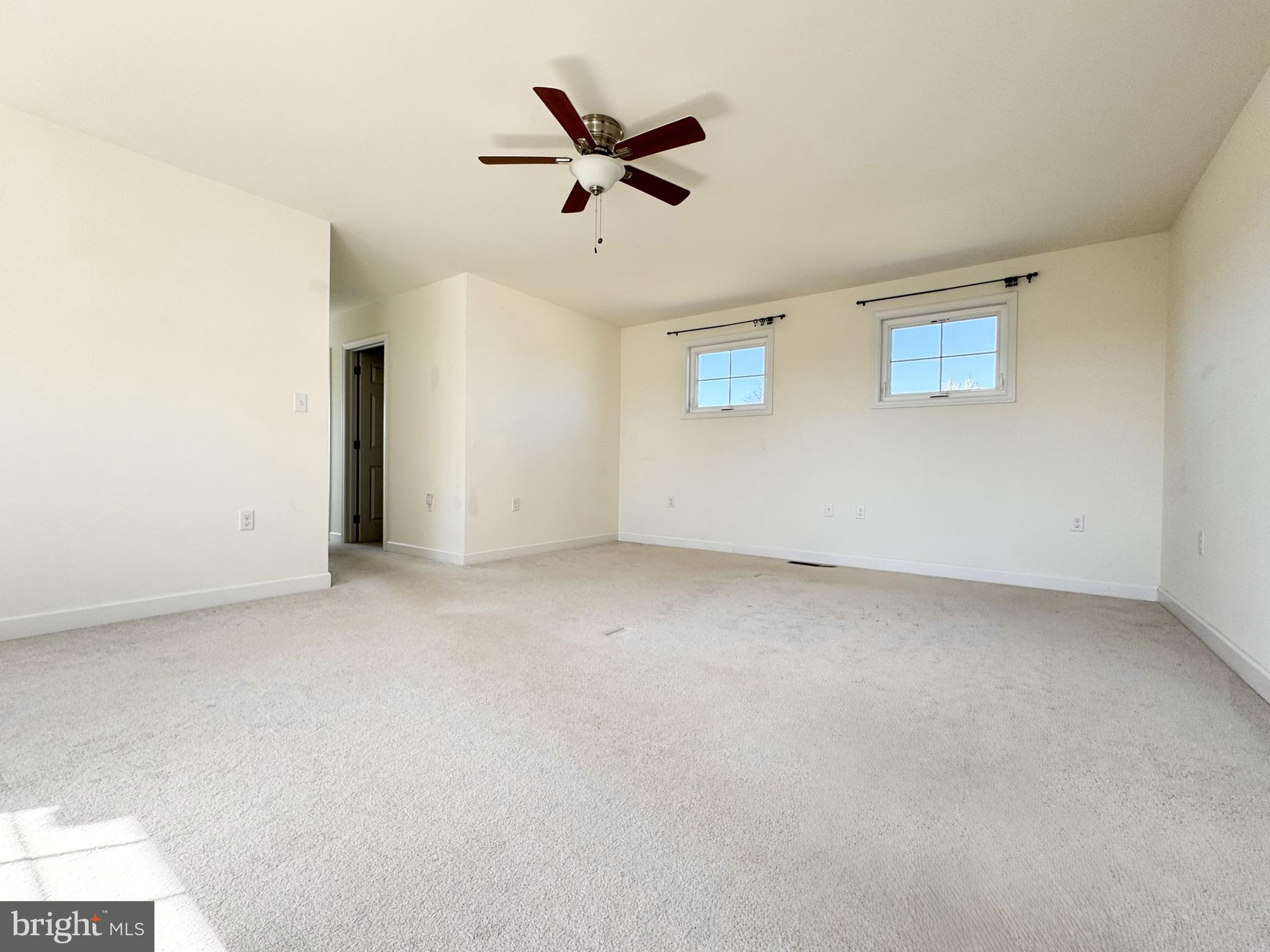 20 Lippitt Road Honey Brook, PA 19344 - Photo 19 of 38 an empty room with ceiling fan and window