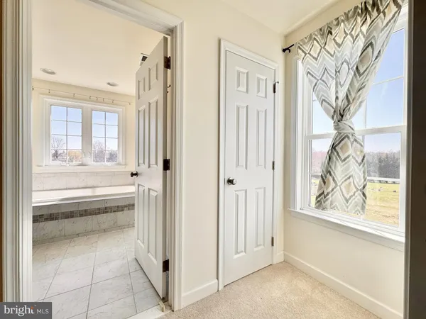 a view of a entryway with wooden floor