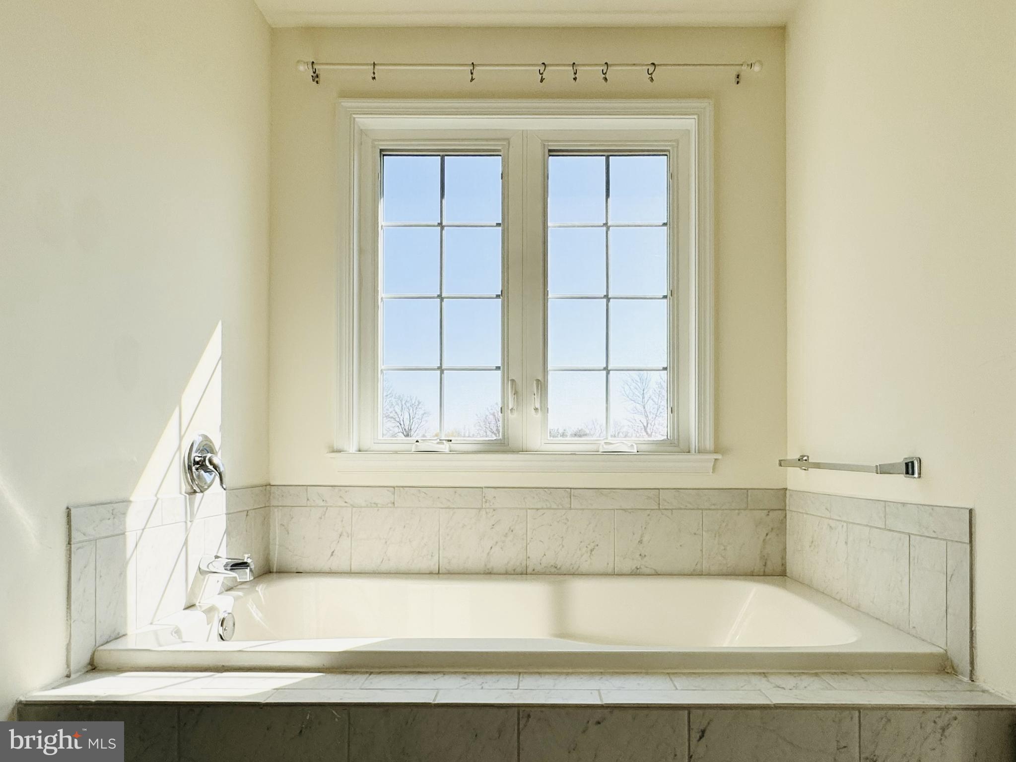 20 Lippitt Road Honey Brook, PA 19344 - Photo 23 of 38 a bathroom with a bathtub and next to a window