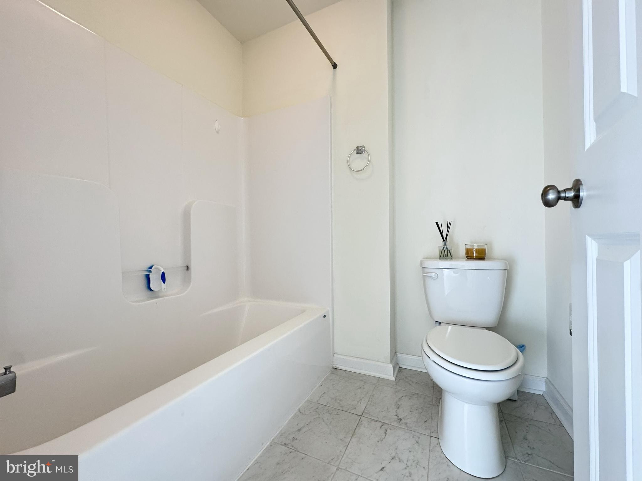 20 Lippitt Road Honey Brook, PA 19344 - Photo 29 of 38 a white toilet sitting next to a white tub