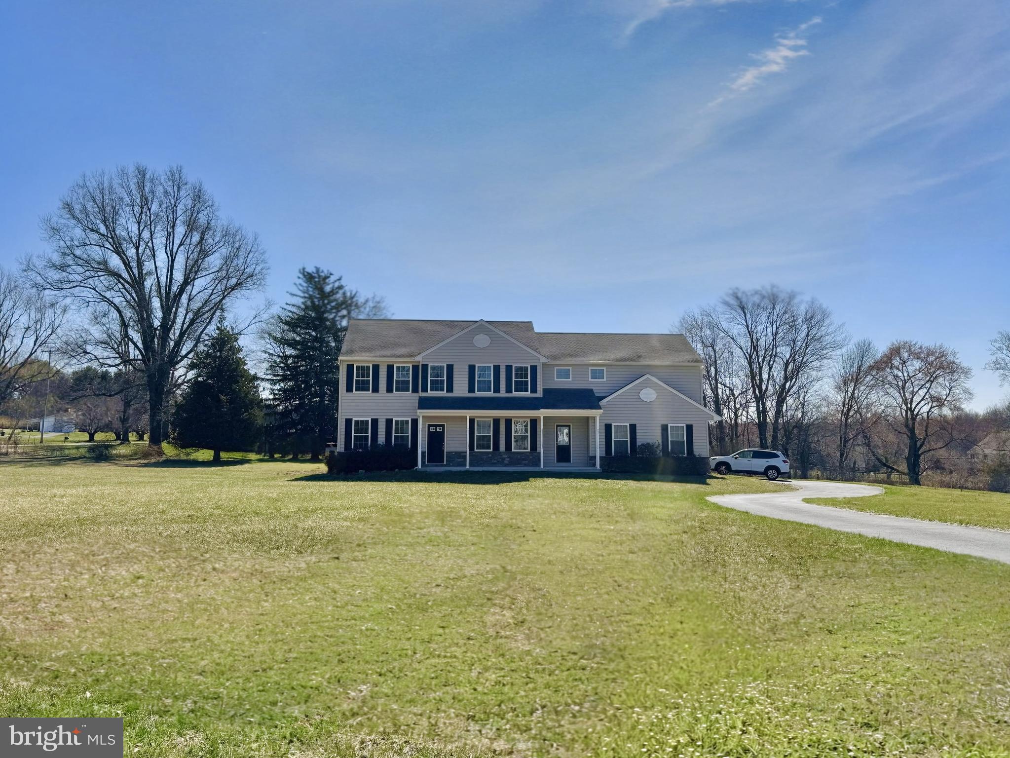 20 Lippitt Road Honey Brook, PA 19344 - Photo 3 of 38 a view of a large pool with a house in the background
