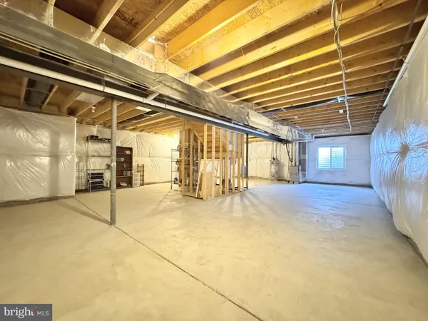 a view of a garage with wooden floor
