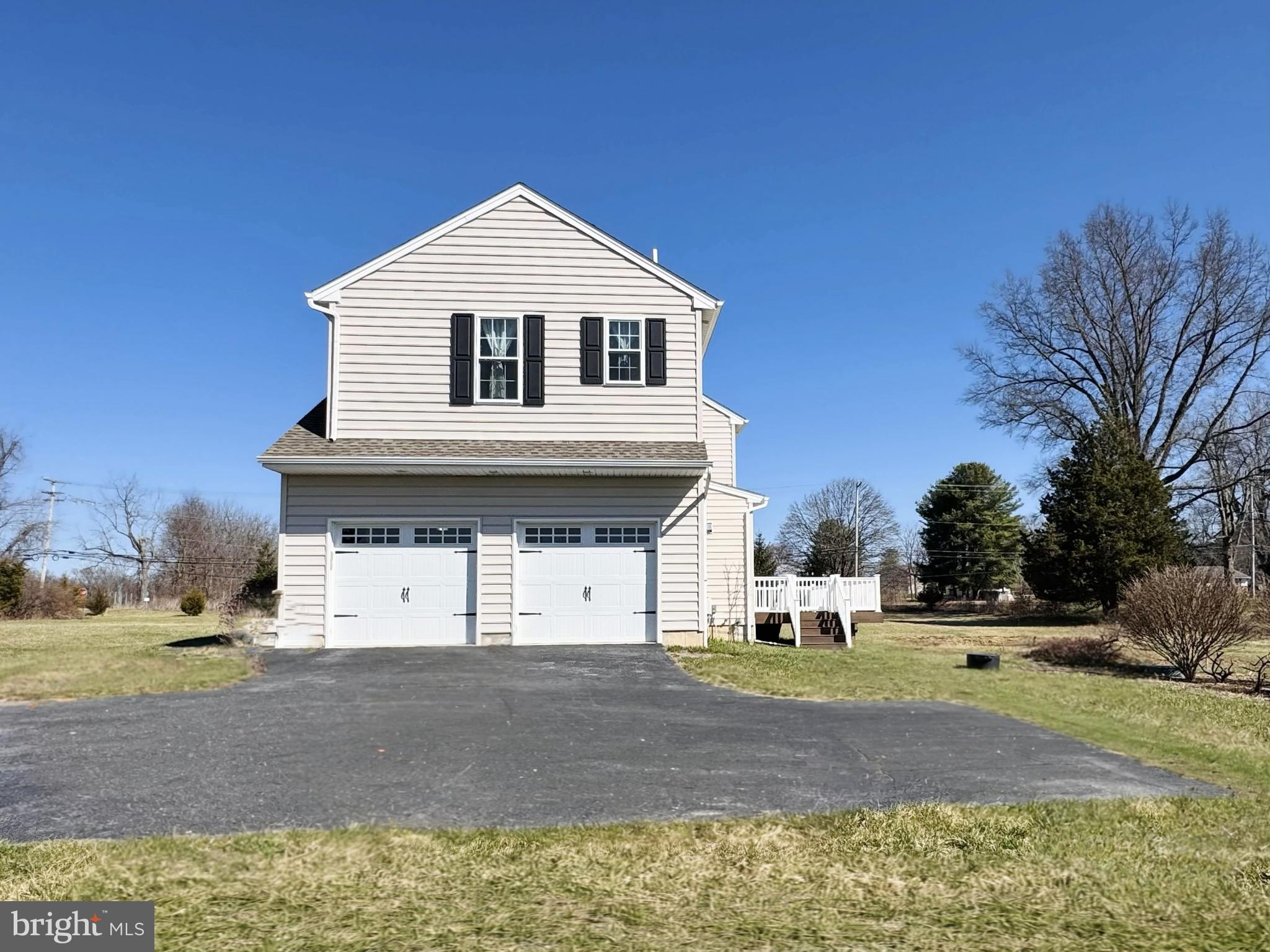 20 Lippitt Road Honey Brook, PA 19344 - Photo 38 of 38 a view of a white house with a yard and large tree