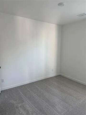 a bathroom with a toilet and a bathtub