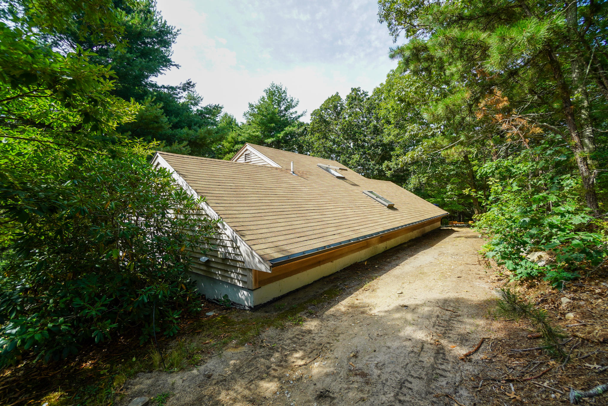 92 Springhill Road Vineyard Haven, MA 02568 - Photo 11 of 38 a view of a yard with a wooden fence