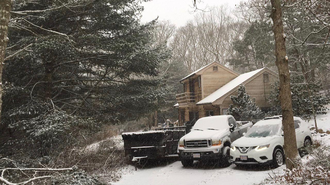 92 Springhill Road Vineyard Haven, MA 02568 - Photo 16 of 38 a car parked in front of a white house