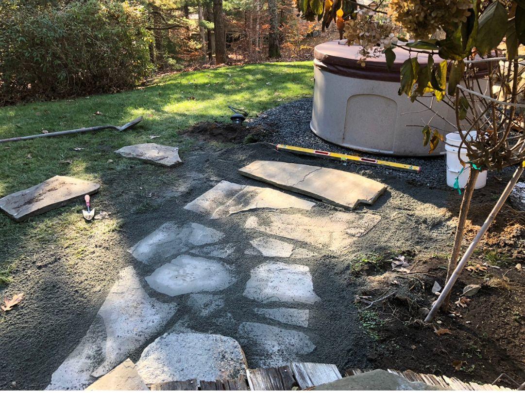 92 Springhill Road Vineyard Haven, MA 02568 - Photo 19 of 38 a backyard of a house with yard and outdoor seating