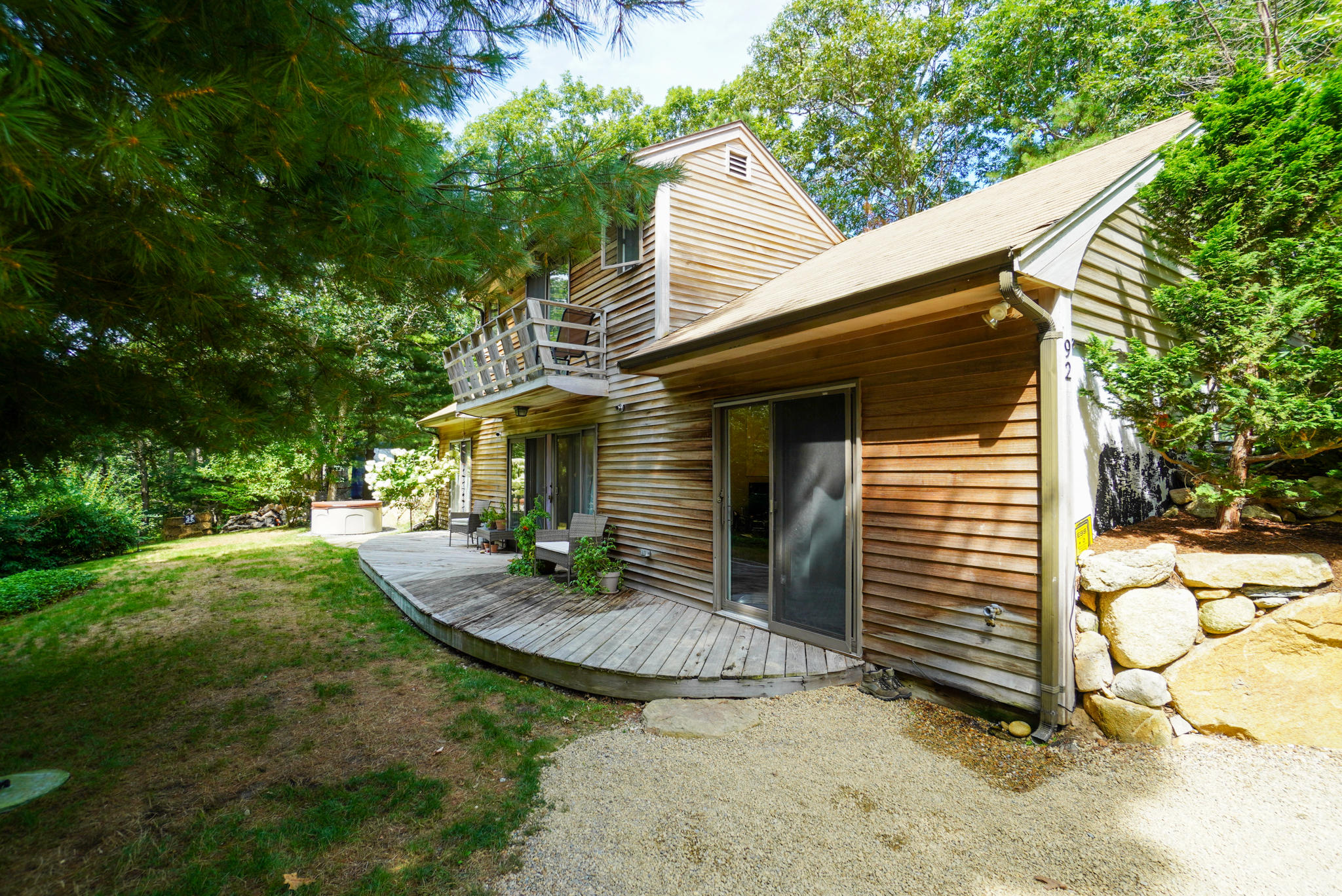 92 Springhill Road Vineyard Haven, MA 02568 - Photo 2 of 38 a view of a house with backyard and sitting area
