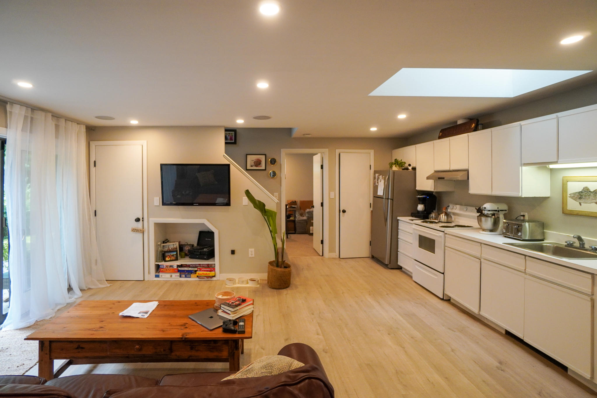 92 Springhill Road Vineyard Haven, MA 02568 - Photo 25 of 38 a large kitchen with stainless steel appliances wooden floor and a refrigerator