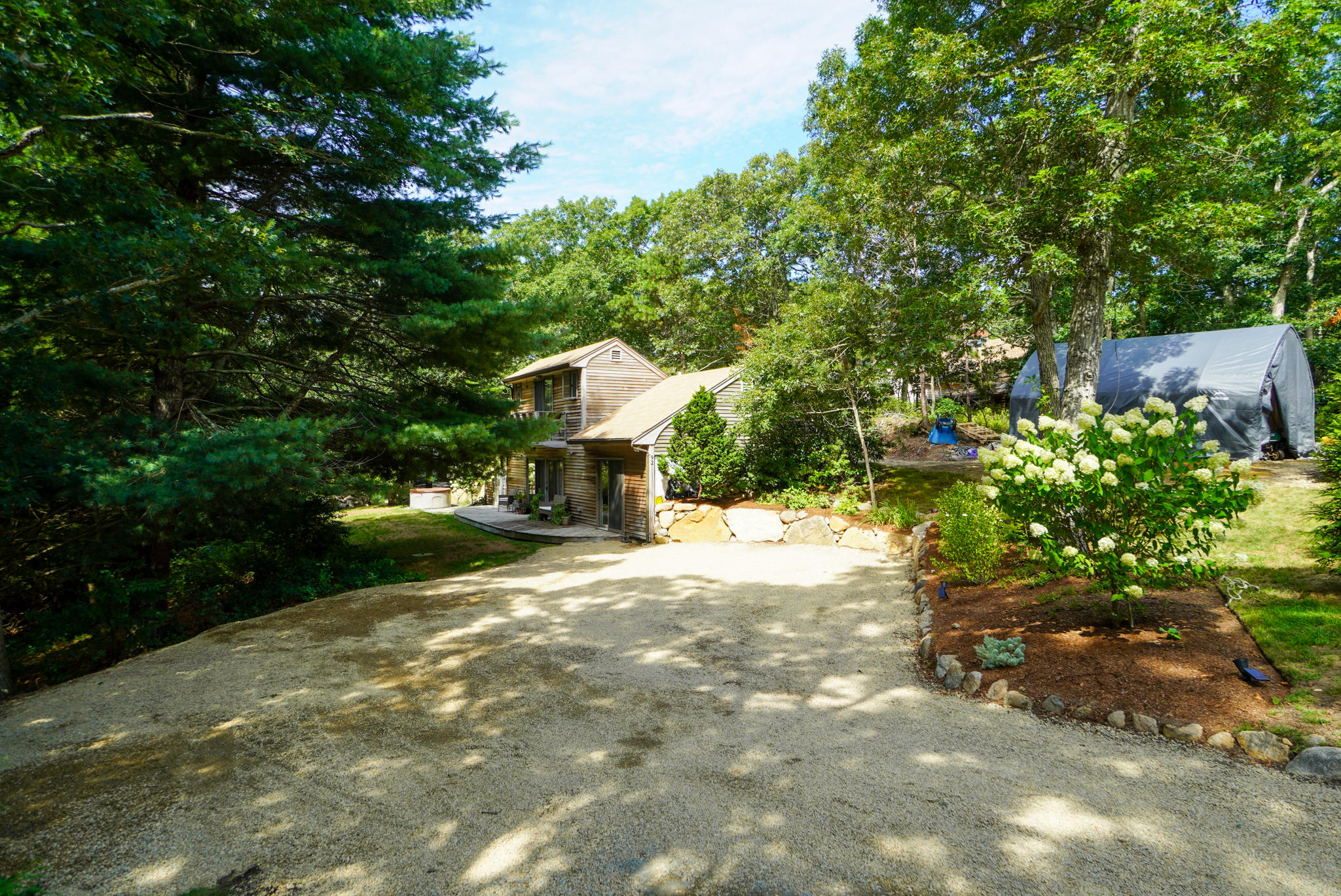 92 Springhill Road Vineyard Haven, MA 02568 - Photo 3 of 38 a view of a house with garden and a tree