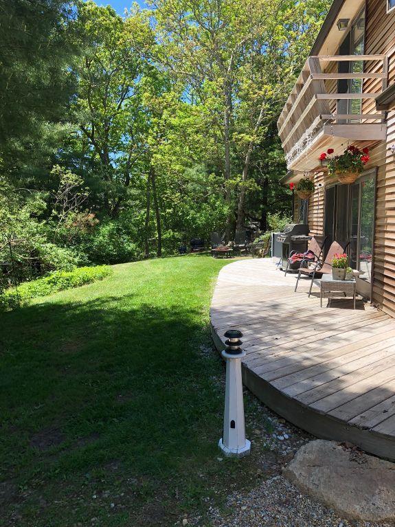 92 Springhill Road Vineyard Haven, MA 02568 - Photo 8 of 38 a view of a house with backyard