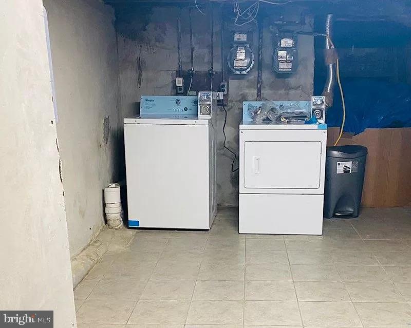 407 South 20th Street, Unit A Philadelphia, PA 19146 - Photo 13 of 14 a utility room with dryer and washer