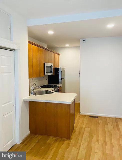 407 South 20th Street, Unit A Philadelphia, PA 19146 - Photo 3 of 14 a view of work space with wooden floor