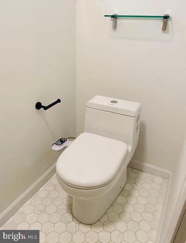 407 South 20th Street, Unit A Philadelphia, PA 19146 - Photo 6 of 14 a white toilet sitting next to a white wall