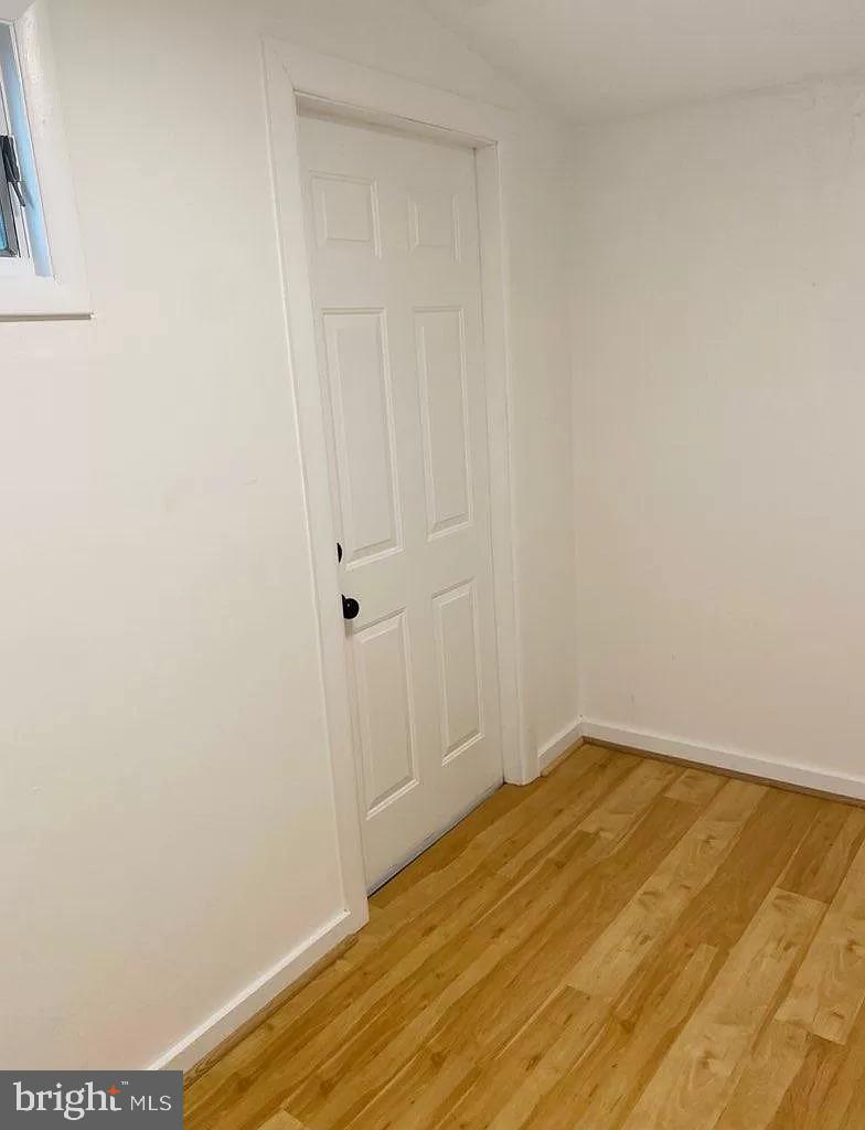 407 South 20th Street, Unit A Philadelphia, PA 19146 - Photo 10 of 14 a view of small space with wooden floor