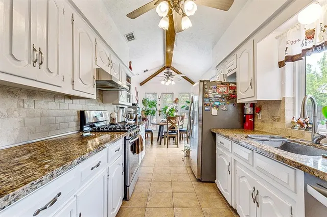 a kitchen with lots of counter top space