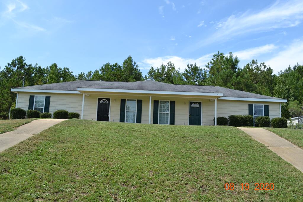 12a Crosswinds Road Phenix City, AL 36869 - Photo 1 of 21 a front view of a house with a garden
