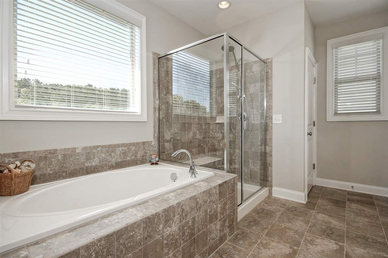 8209 Pritchett Farm Lane Raleigh, NC 27606 - Photo 17 of 30 SPACIOUS TILED SHOWER