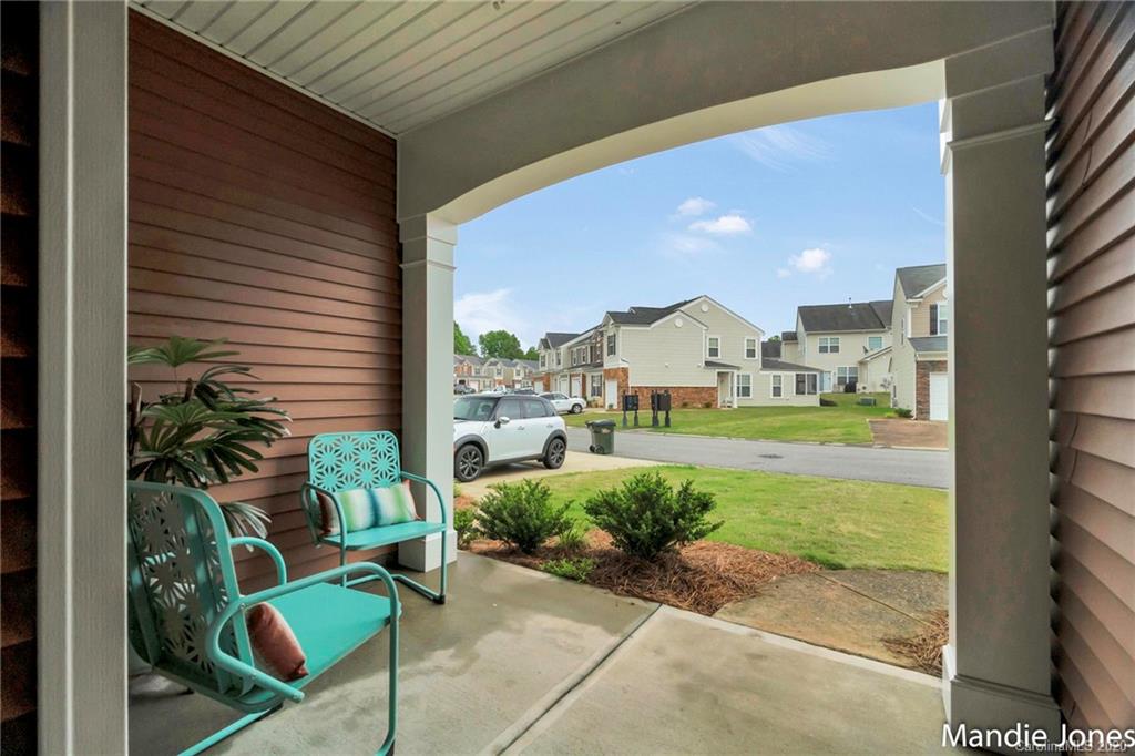 276 River Clay Road Fort Mill, SC 29708 - Photo 5 of 31 a view of living room that has a table and chairs in patio