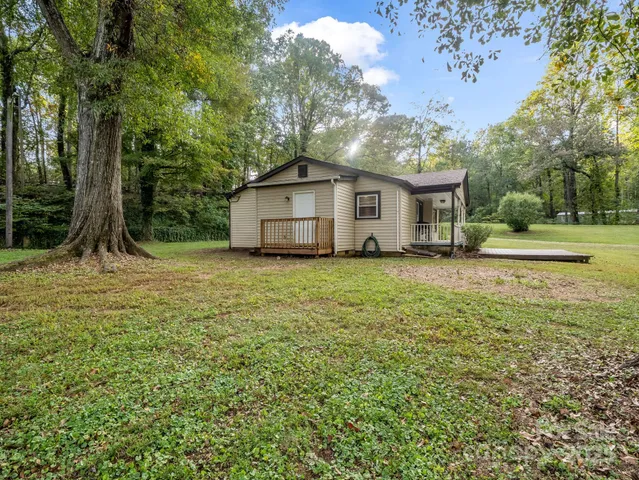 a house with a tree in front of it