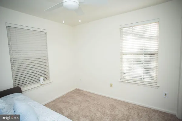 a view of a bedroom with a window