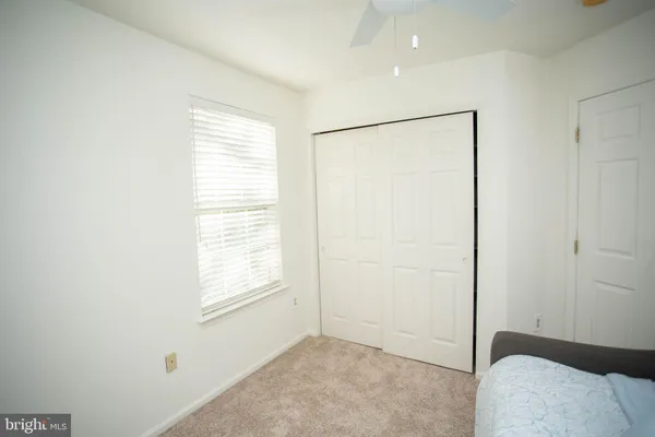 a view of livingroom with furniture and a window