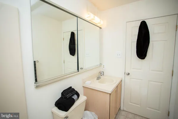 a bathroom with a sink and mirror