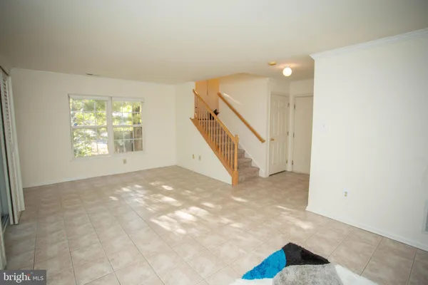 a view of entryway and hall with a window