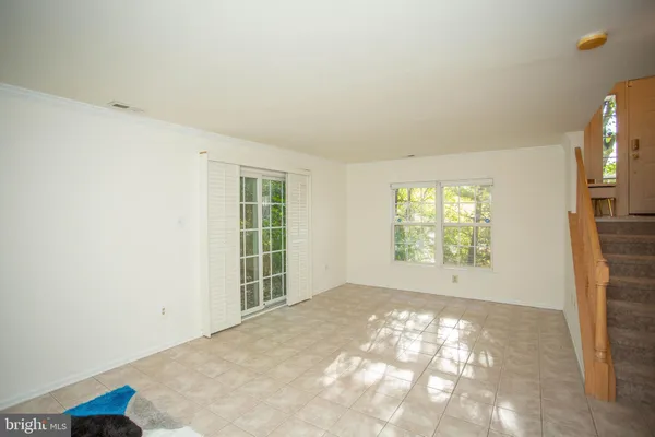 an empty room with windows